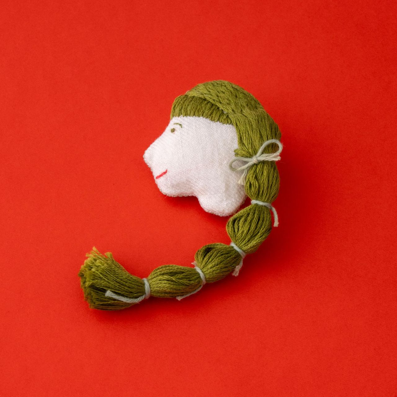 小糸商店/横顔ちゃんブローチ(若草色･玉ねぎむすび)