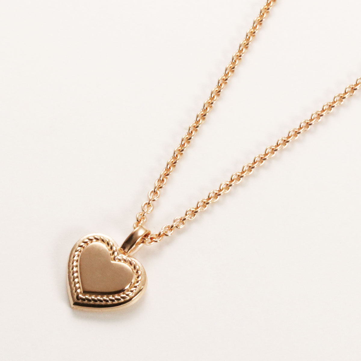 HEART ENCLOSED SIGNET PENDANT