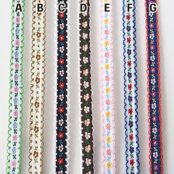 両サイドのかぎ針編みクロシェットの縁取りがポイントのレトロなお花