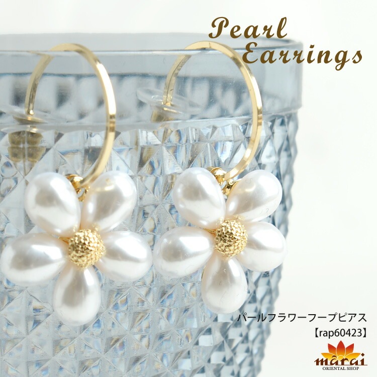 さり気ない華やかさ。パールフラワーフープピアス  の通販