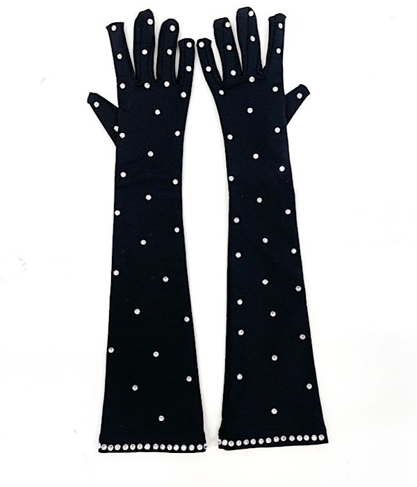 手袋を着用したフィギュア ぽかぽかスケート手袋 黒 - フィギュアスケートのコスチューム新