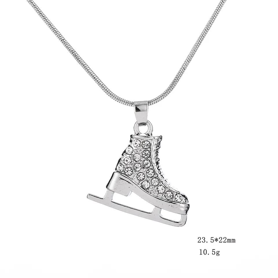 アクセサリー付きのスケートを販売しています。 イニシャルスケート靴キーリング - フィギュアスケートのコスチューム