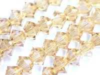 キラキラカット★限定入荷★お得なロングタイプ★ファッションビーズ/オレンジゴールド/ボタンカット/10×7mm/1連（約50cm）【天然石/パワーストーン】【アメリカツーソン・香港展示会・世界各地出展