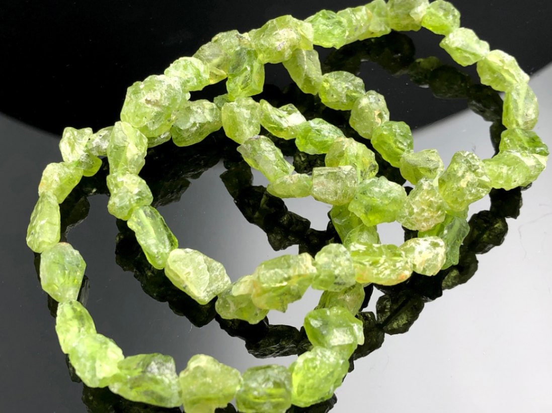 【高透明度】ペリドット ブレスレット 10〜11mm アフガニスタン産 楽天市場】ペリドット アフガニスタン産 ブレスレット 10mm珠