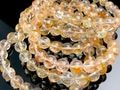 ブラジル産★天然石ブレスレット/イエローライモナイトインクォーツ(オーロラクォーツ/Aurora Quartz/Limonite in Quartz/褐鉄鉱/金魚水晶)/ラウンド/約8mm/1本【天然