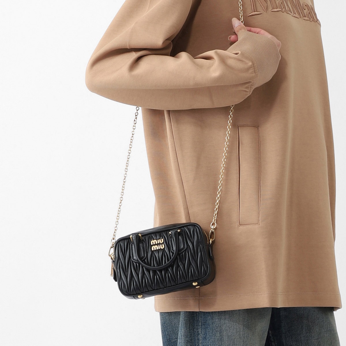 極上美品　直営店購入品　MIUMIUカモフラージュ ショルダー 5BH158 楽天市場】訳あり 正面ロゴ部分に錆汚れ、保護袋に汚れあり MIU