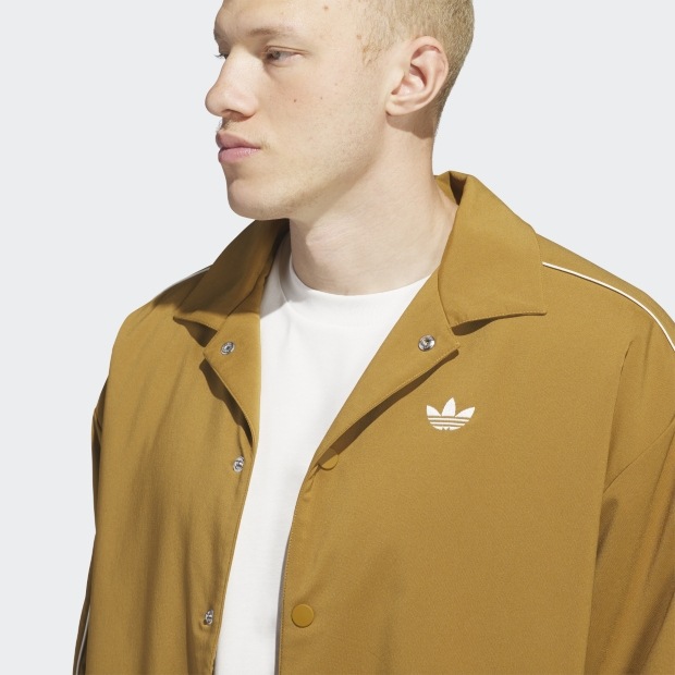 ADIDAS ORIGINALS コーチジャケット ブロンズストラータ×アイボリー