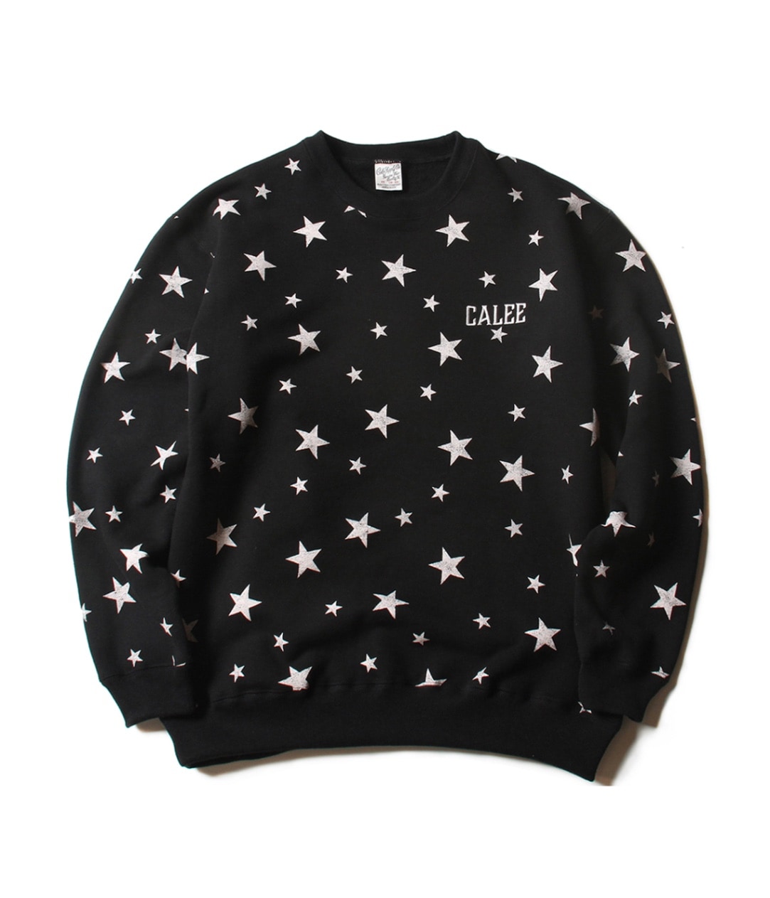 トップス CALEE ALLOVER PATTERN SWEAT ALLOVER STAR PATTERN L/S SWEAT【BLACK/PINK】｜CALEE｜MELTING POT