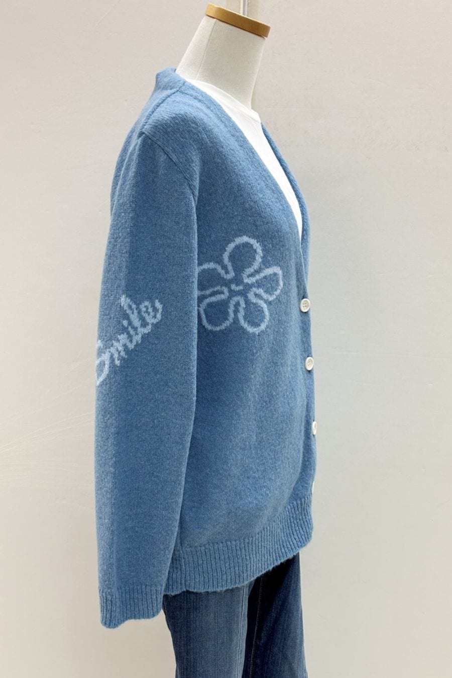 袖にsmileとalohaの文字が