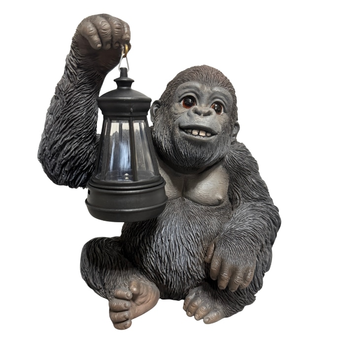 かわいい 置物 ソーラーランプを右手で持ち上げる黒ゴリラ グッズ