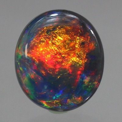 青い斑の浮かぶ魅力的なオレンジオパール74.5ct/ファイアオパール/鉱物標本 青い斑の浮かぶ魅力的なオレンジオパール74.5ct/ファイア