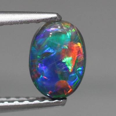 0.54ct天然ブラックオパール【レッドマルチ美遊色】