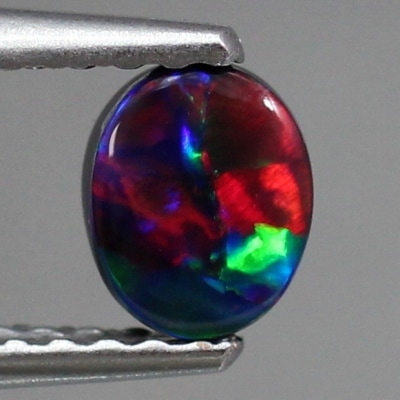 天然ブラックオパール 0.39ct 【黒生地・レッド遊色】