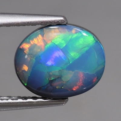 天然ブラックオパール 1.10ct 【ミルキーマルチ遊色】 黒生地