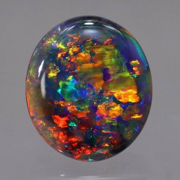 天然ブラックオパール 0.91ct 【レッドマルチ美遊色】