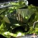 天然ペリドット 0.42ct 【隕石・レインボー】 パラサイト