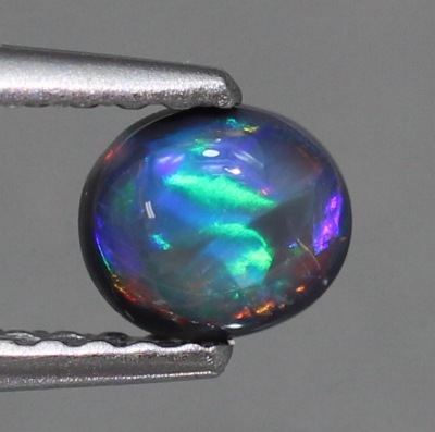 天然ブラックオパール　0.34ct　【ローリング遊色】 レッド
