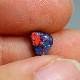 天然ブラックオパール 0.60ct 【レッド】 高品質