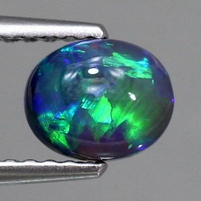 天然ブラックオパール 0.64ct 【鮮やかグリーン遊色】