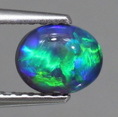 天然ブラックオパール 0.64ct 【鮮やかグリーン遊色】