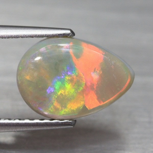 青い斑の浮かぶ魅力的なオレンジオパール74.5ct/ファイアオパール/鉱物標本 オパールとは？ | 洋灯舎