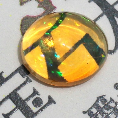 天然メキシコオパール 0.55ct 【オレンジ&遊色】