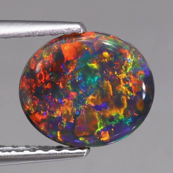 天然ブラックオパール 0.91ct 【レッドマルチ美遊色】