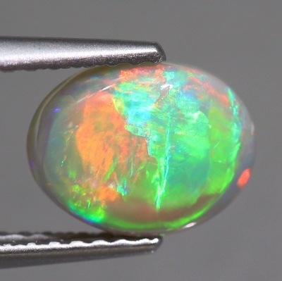 天然オパール 1.24ct 【輝くグリーン&オレンジ】 ライトニングリッジ
