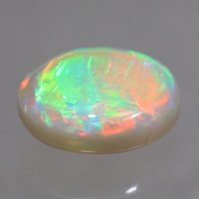 天然オパール 1.24ct 【輝くグリーン&オレンジ】 ライトニングリッジ