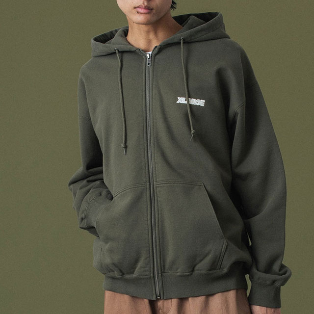 エクストララージ XLARGE スランテッドOG ジップフーデッドスウェット 