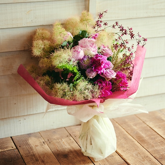 アースカラーの豪華な花束