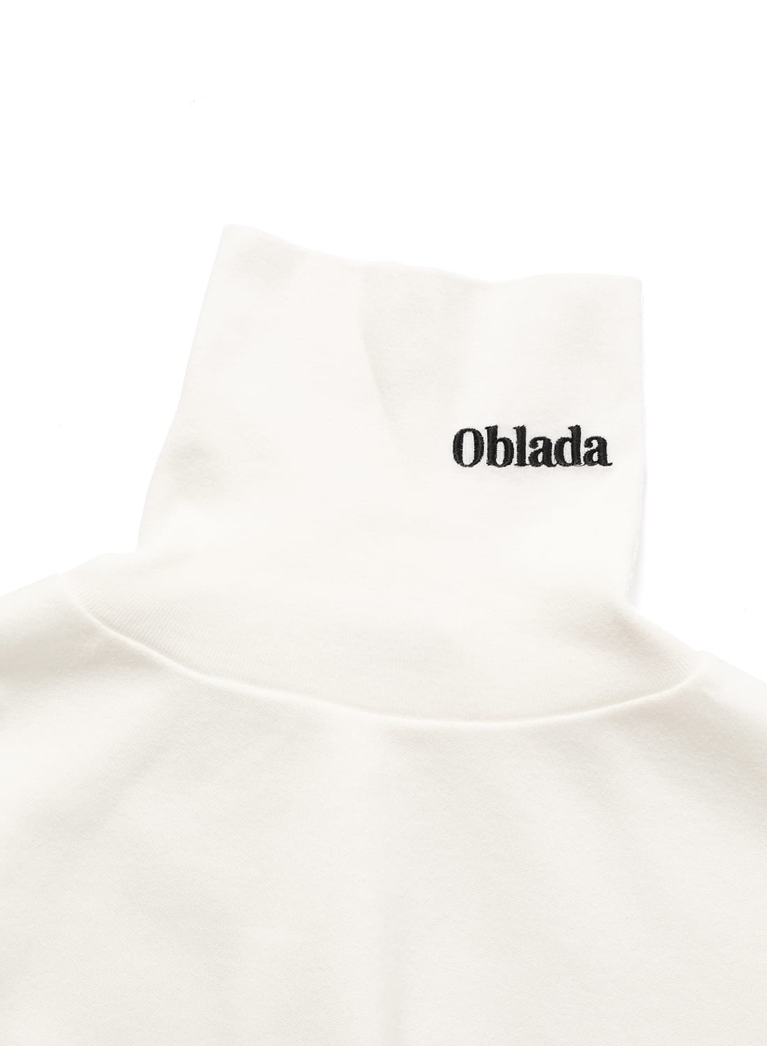 Oblada オブラダ　長袖 カットソー ホワイト Oblada(オブラダ)/HOLY HIGH NECK(ホーリー ハイネック)トップス