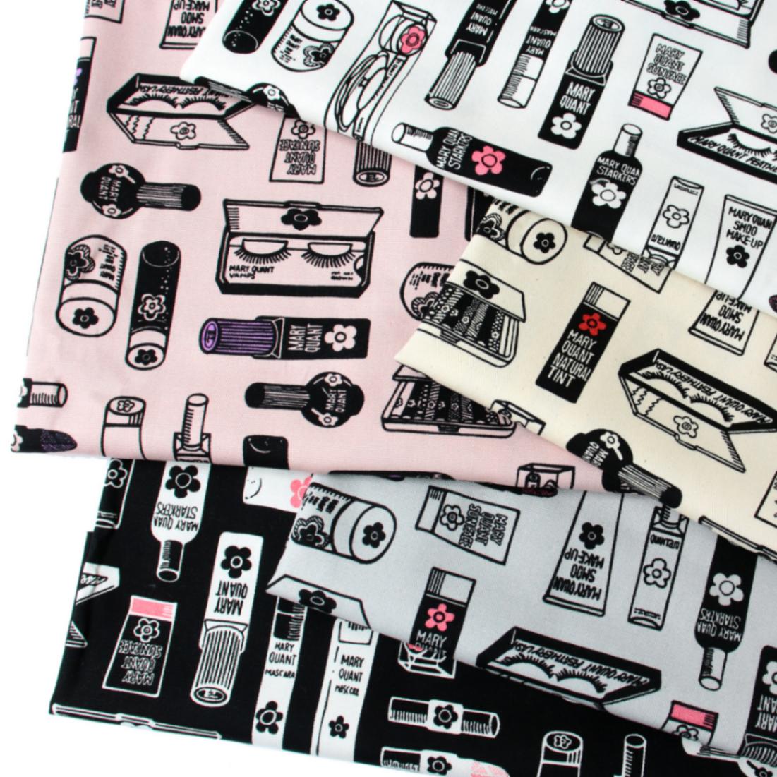 マリークワント｜化粧品柄｜オックス生地｜ホワイト｜キャラクター布