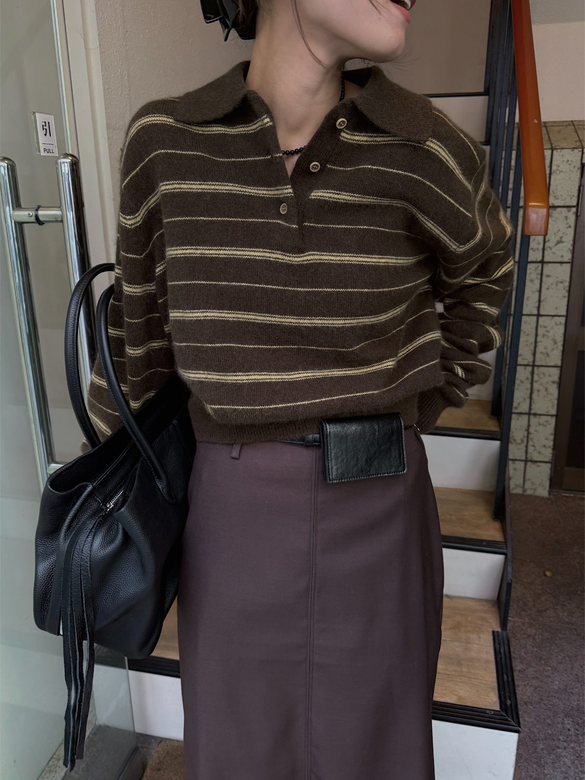 random border raccoon polo knit