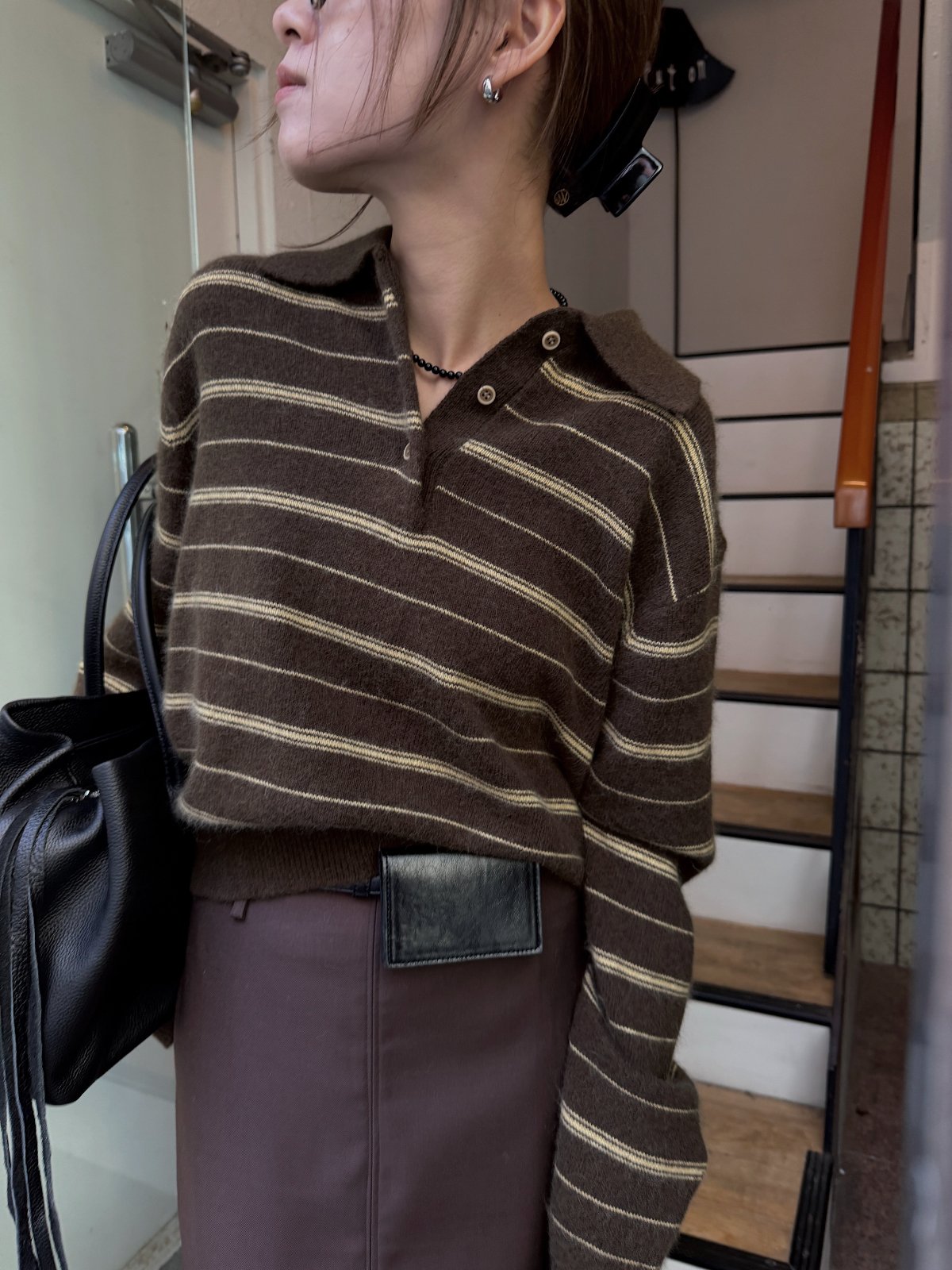 random border raccoon polo knit