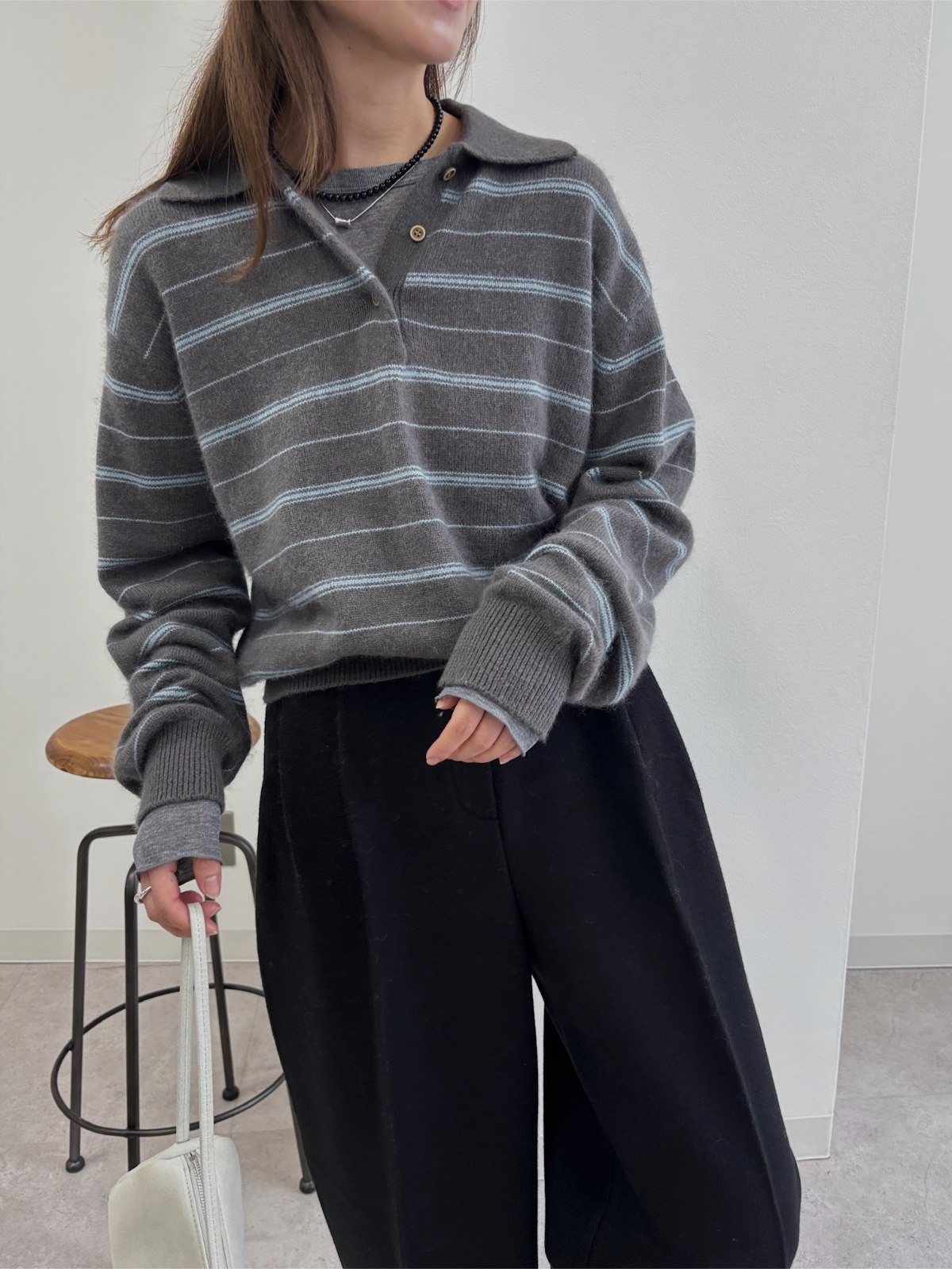 random border raccoon polo knit