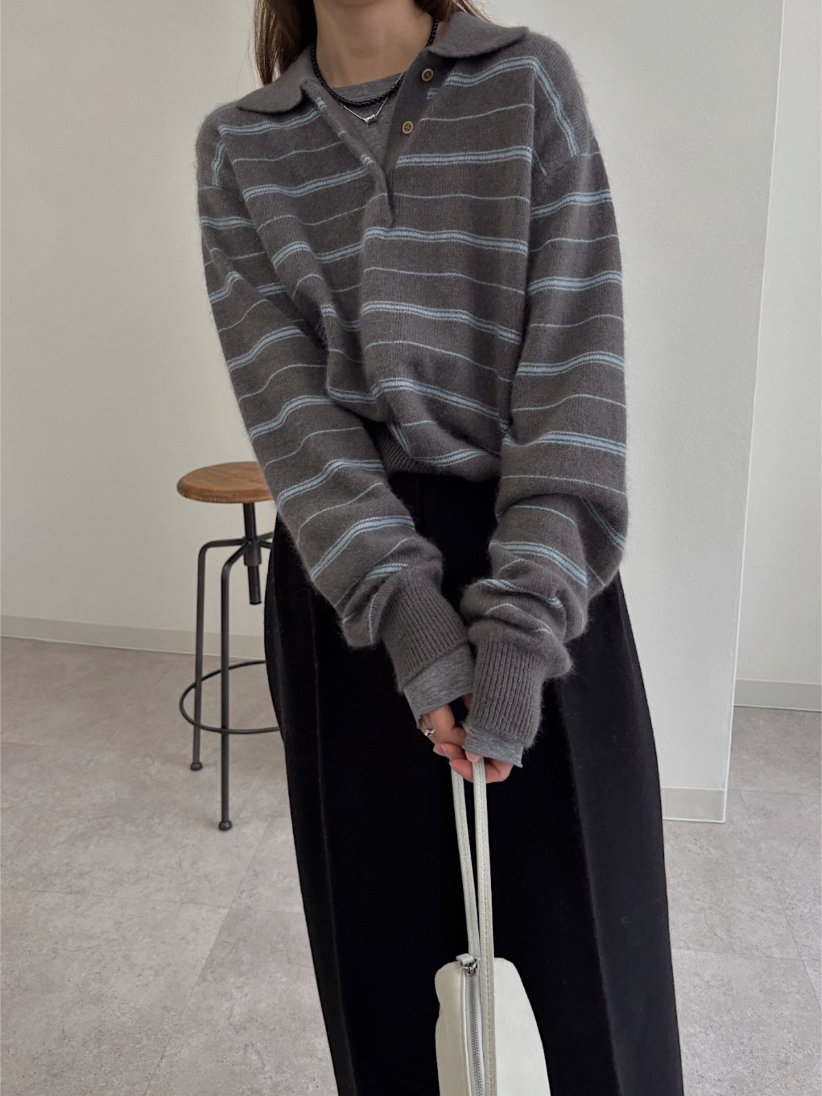 random border raccoon polo knit