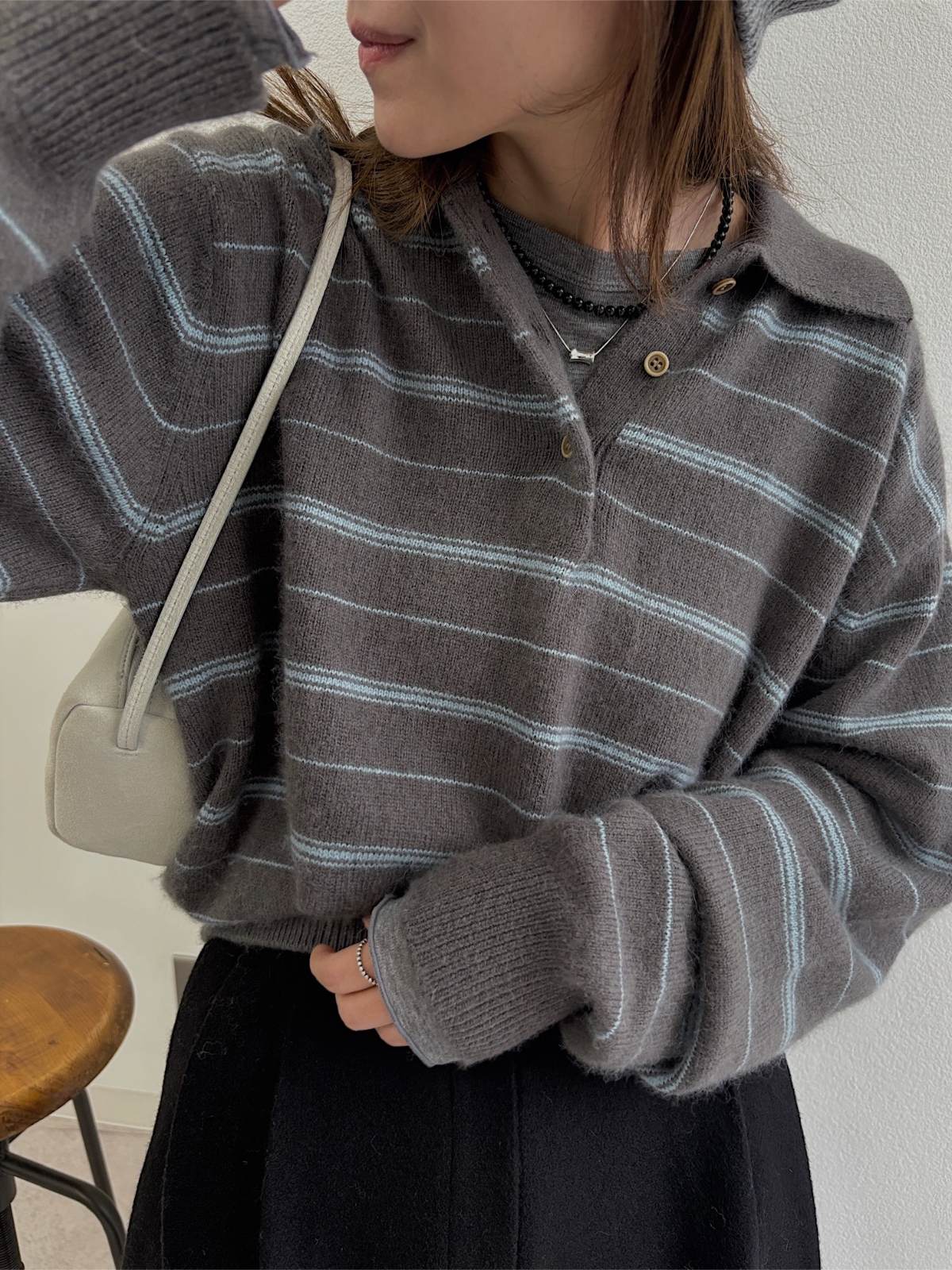 random border raccoon polo knit