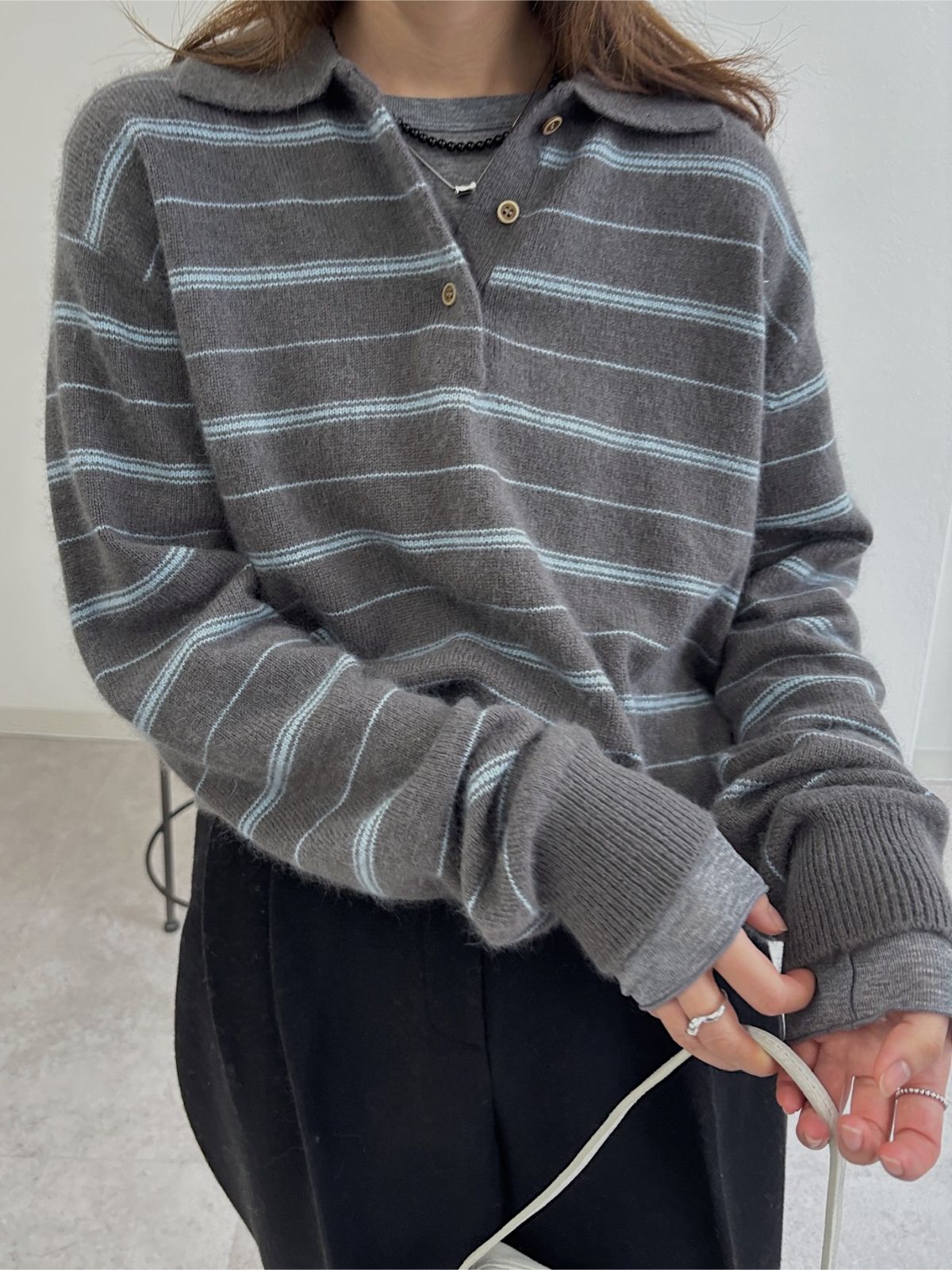 random border raccoon polo knit