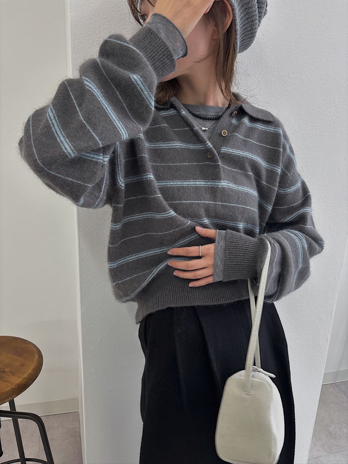 random border raccoon polo knit