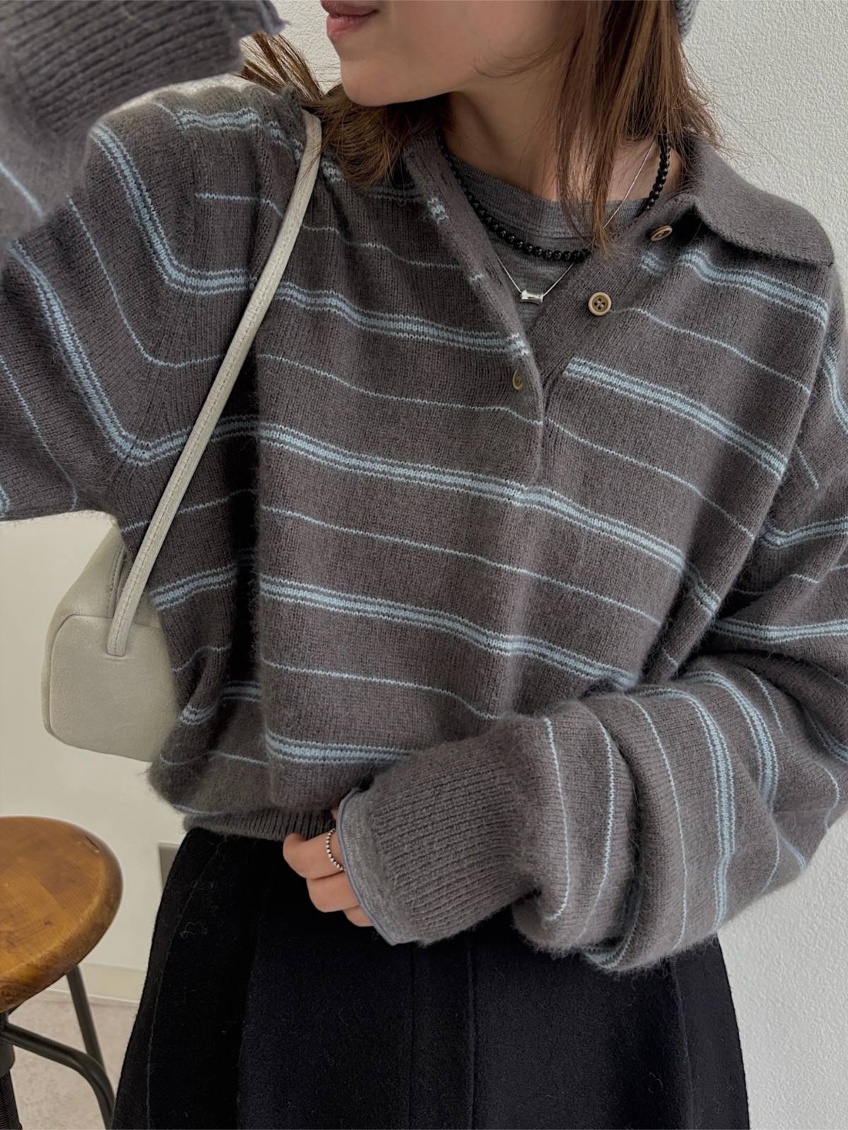 random border raccoon polo knit