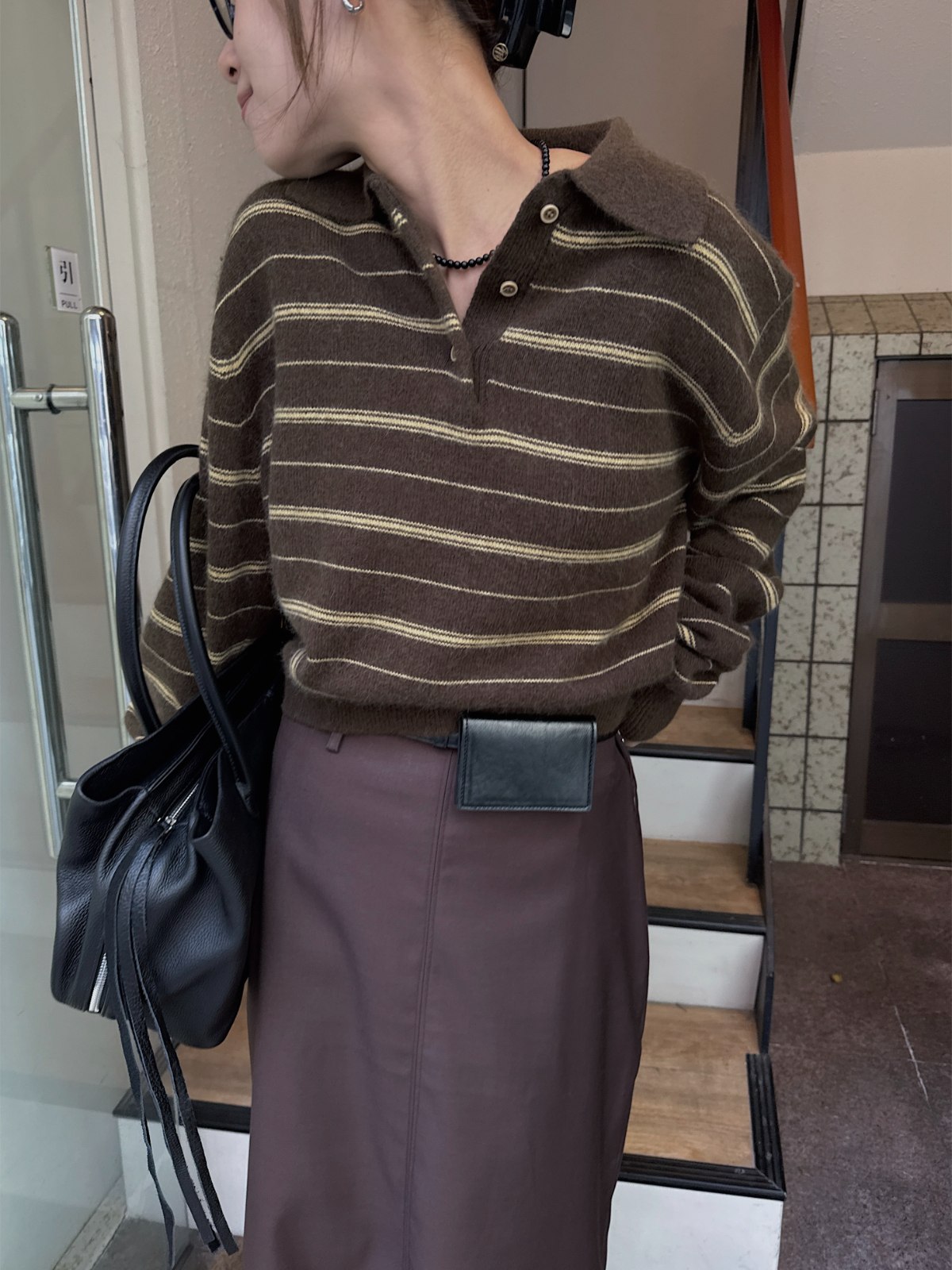 random border raccoon polo knit
