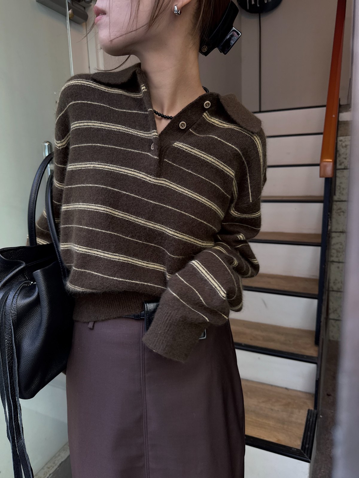 random border raccoon polo knit