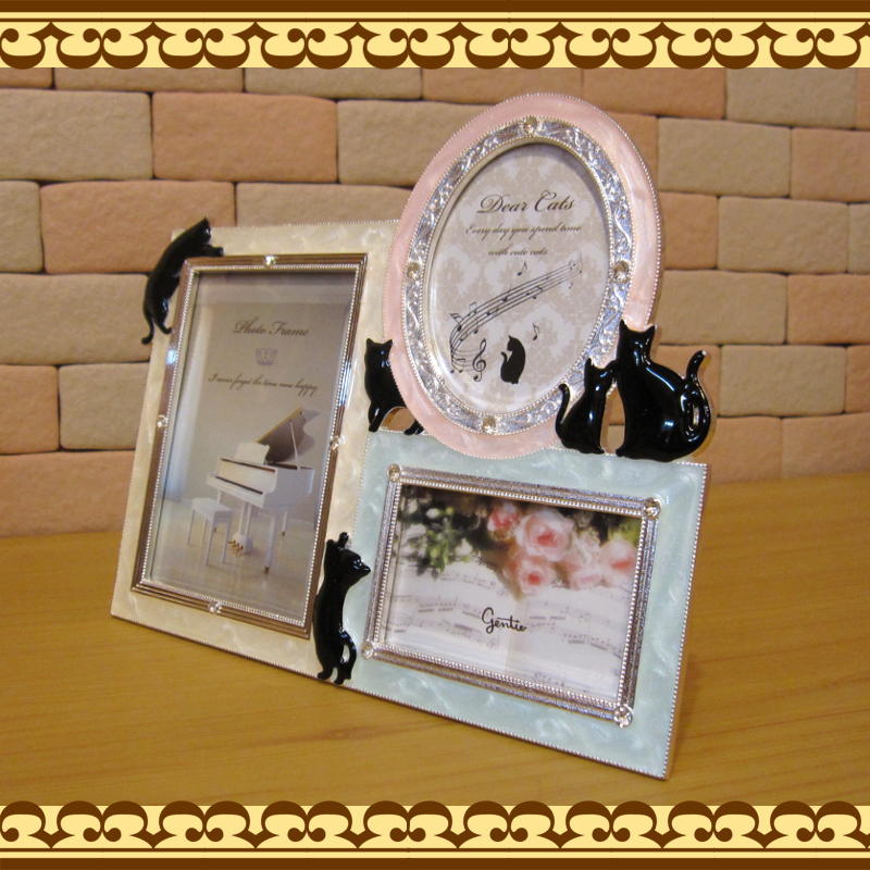 フレームの透かし模様がエレガント 黒猫モチーフのフォトフレーム