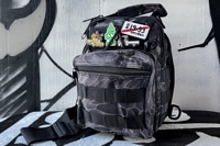 OSSANTHEHOOD camo sling bag (black python)