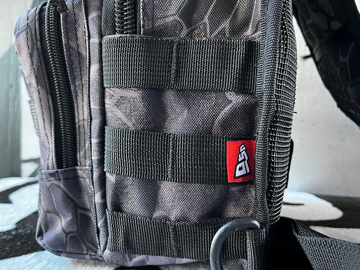 OSSANTHEHOOD camo sling bag (black python)