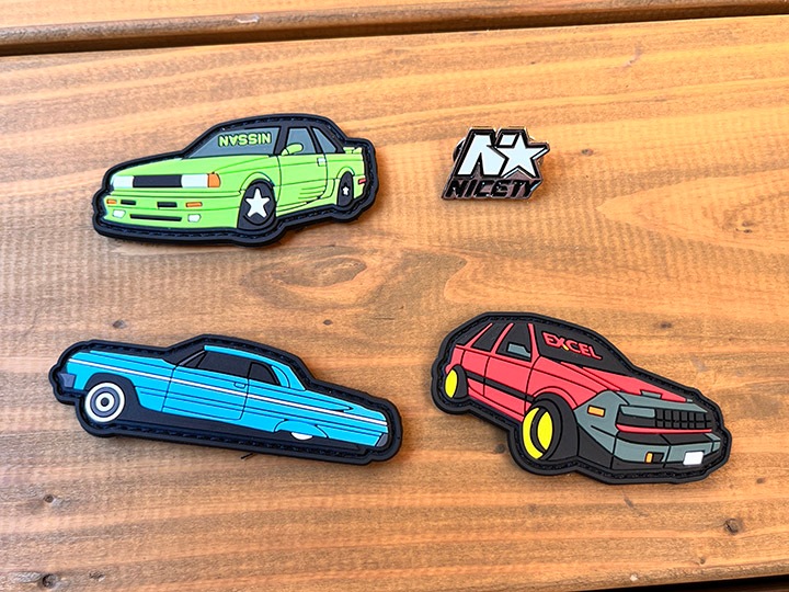 NICETY patched sling bag / black