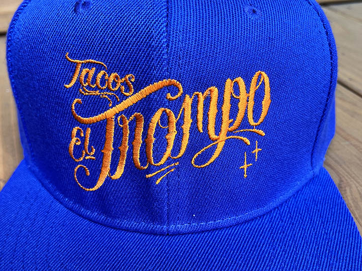 Tacos El Trompo snapback cap (script) / royal x orange