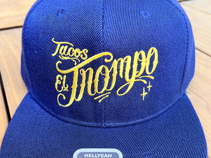 Tacos El Trompo snapback cap (script) / navy x yellow