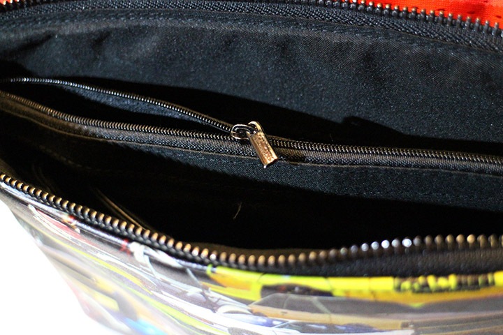 OSSANTHEHOOD clutch bag / multi